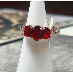 Ring Bomb Party Ring, NWOT, size 7, red stones, gold color band